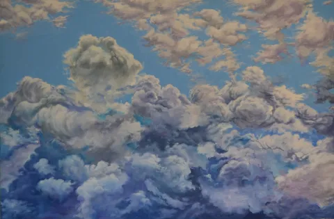 Mesh of white and blueish clouds on blue sky